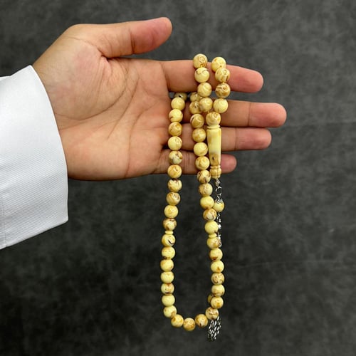 سبحه بكلايت لون بيج مموج مع كركوشة