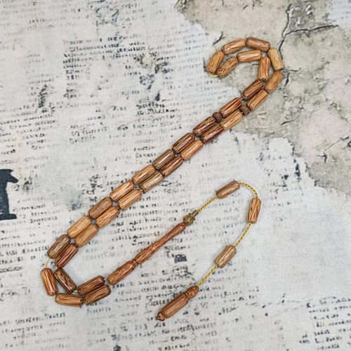 سبحة جذع النخل الطبيعي – فخامة من قلب الطبيعة