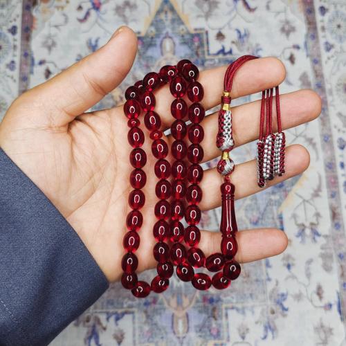 سبحة زعفراني احمر شفاف