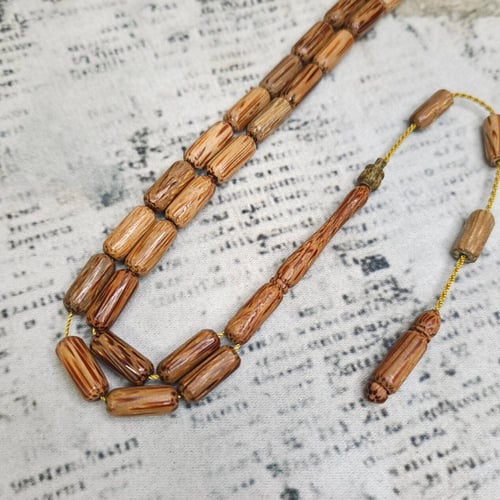 سبحة جذع النخل الطبيعي – فخامة من قلب الطبيعة