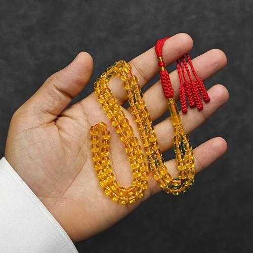 سبحة شبيه الكهرمان مستكه ٩٩ خرزة شفاف