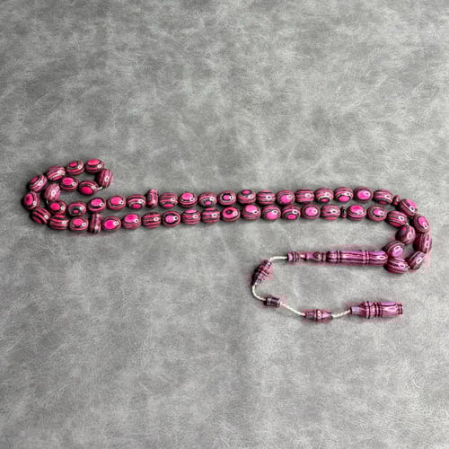 سبحة خشب مضغوط زهري