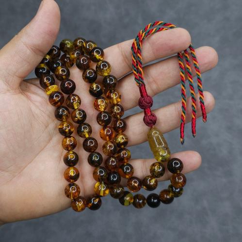 سبحة كهرمان شوائب طبيعي