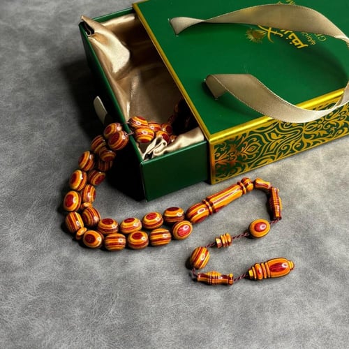 سبحة خشب مضغوط برتقالي