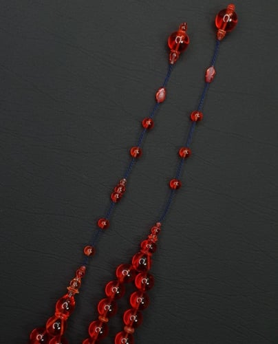 مسباح كاست احمر شفاف