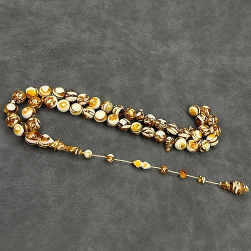 مسباح عاج مع كهرمان طبيعي كبس تمليكة