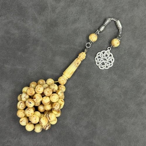 سبحه بكلايت لون بيج مموج مع كركوشة