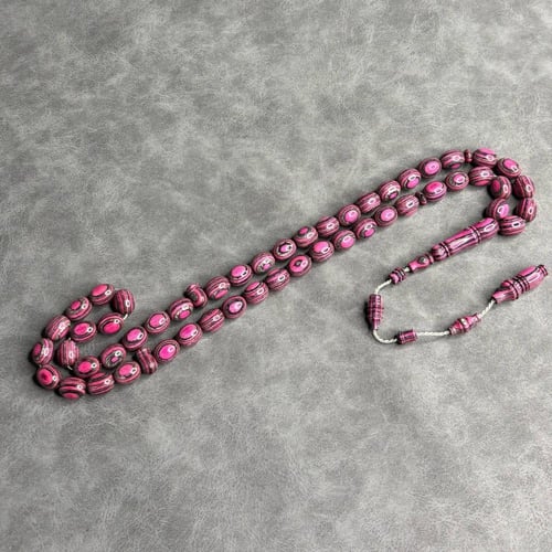 سبحة خشب مضغوط زهري