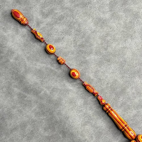 سبحة خشب مضغوط برتقالي