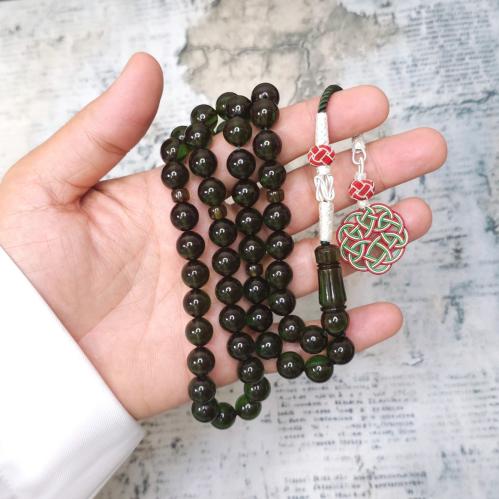 سبحة زعفراني لون زيتي مع طربزونه فضه