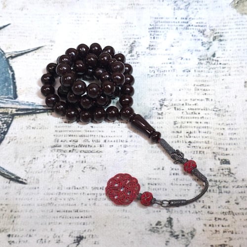 سبحة زعفراني لون حرباء مع طربزونه فضه