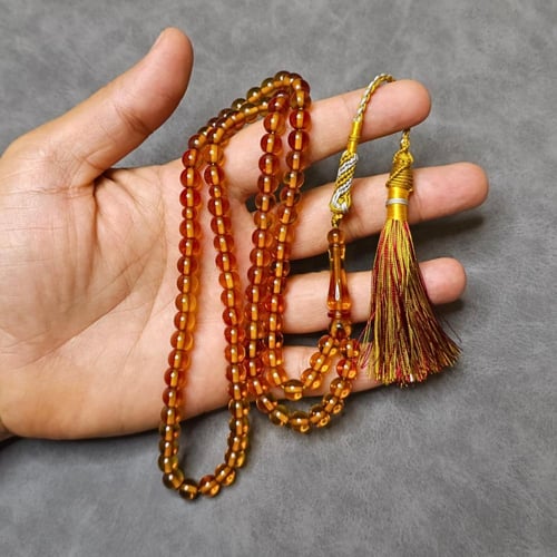 سبحة زعفراني عسلي ٩٩ حبة مع كركوشة تفصال