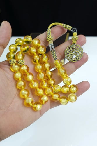 مسباح بكلايت شفاف مع حبات الؤلؤ الطبيعي مع طربزونه