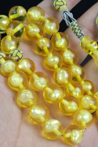 مسباح بكلايت شفاف مع حبات الؤلؤ الطبيعي مع طربزونه