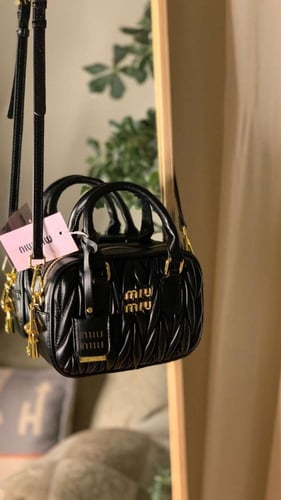 MIU MIU ميو ميو