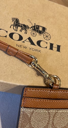 COACH أيدي هولدر كوتش