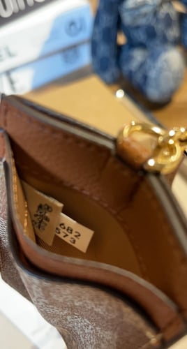 COACH أيدي هولدر كوتش