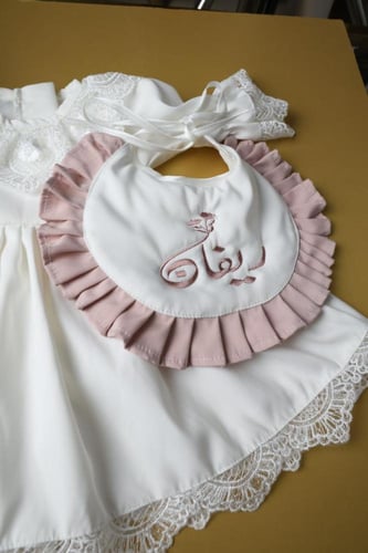 فساتين اطفال حديث ولاده أبيض بلمسات وردية