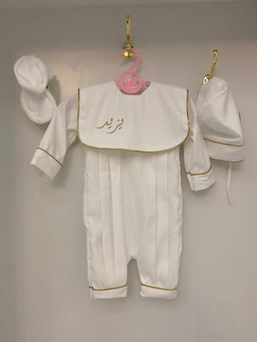 افرول ابيض للرضع بتطريز ذهبي