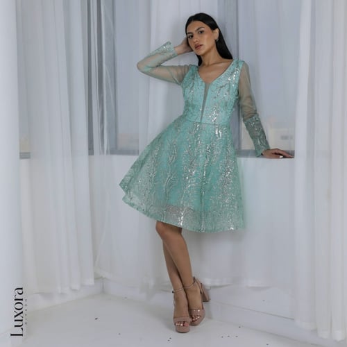 فستان تركوازي للكبار والصغار