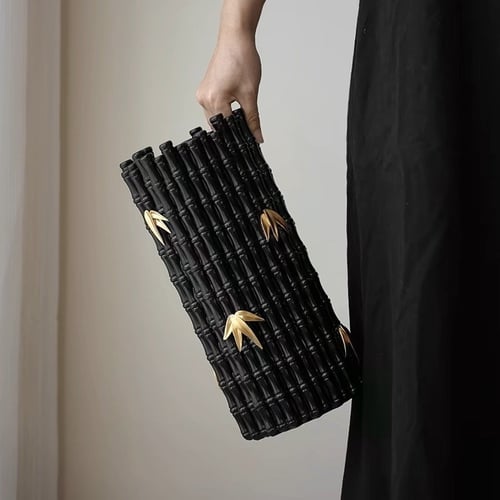 مزهرية بنمط خيزران مزين باوراق شجر ذهبي