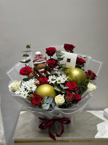 بوكيه مع شوكولاته باتشي وبالونات