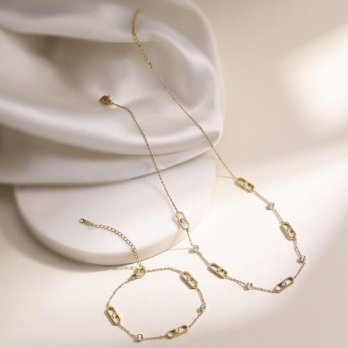 طقم ذهبي سلسال واسوارة مميزة من الستانلس ستيل مرصع...