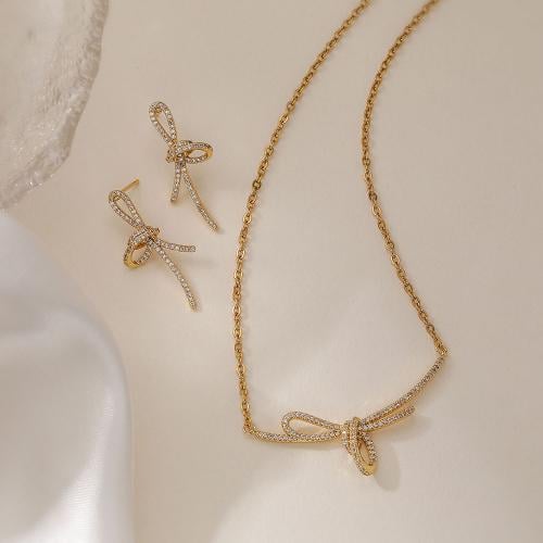 طقم فيونكة من الساتلنس ستيل المرصع بالزركون الاصلي