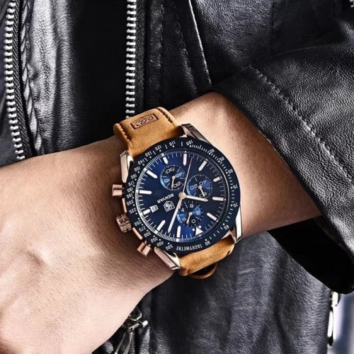 ساعة رجالية بسوار من الجلد الطبيعي - فخامة وأسلوب...