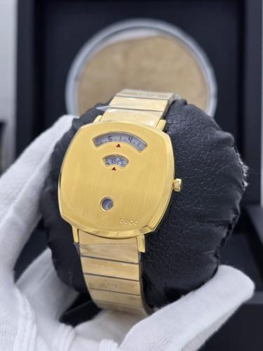 ساعات قوتشي طبلون