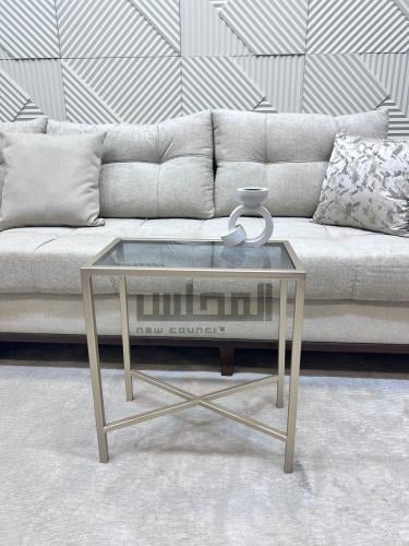 طاولة حديد سطح زجاج