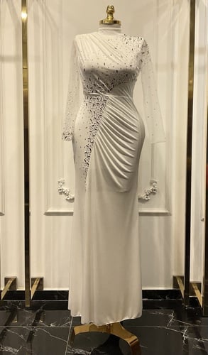 White evening dress embroidered