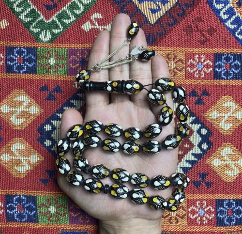 كوك فضة و كهرمان و عاج