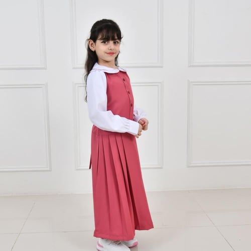 مريول أبتدائي وردي مزين بفيونكة