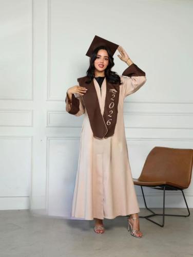 A graduation abaya set in beige with a brown scarf