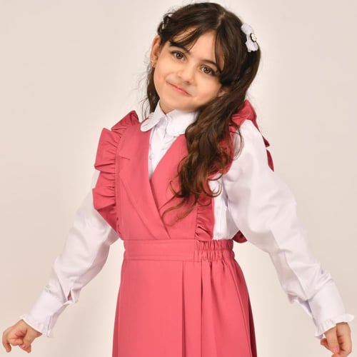 مريول ابتدائي وردي فاتح بكشكش عريض على الاكتاف وكس...