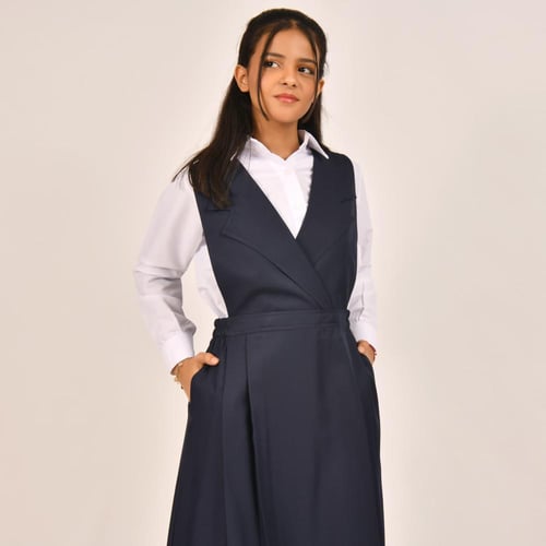 مريول كحلي ثانوي شيال سادة بقصة مثلثة وزم من الجان...