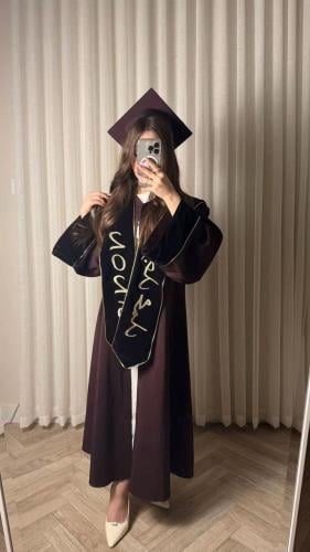 A graduation abaya set in lilac with a velvet scarf and a hat