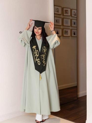 Elegant green Saji graduation abaya set with a dark green scarf – 2026