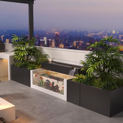 حديقة بشلال ماء وحوض اسماك مدمج بشكل يفوق الخيال