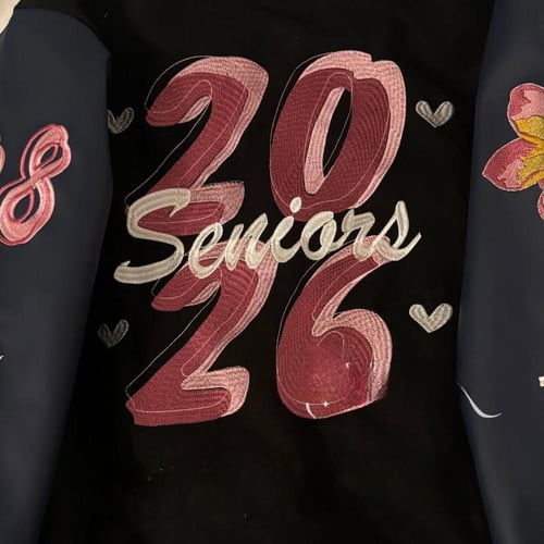 جاكيت اسود أكمام كحلي جلد