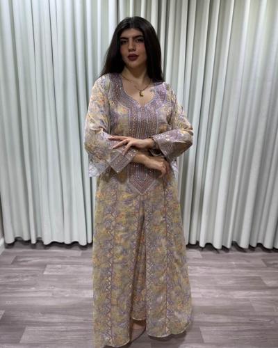 A traditional Beshteer with embroidered pieces, elegant.