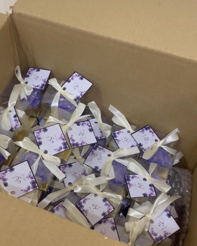 شمعه الكاميليا مُعطره ومُغلفه مع تاق