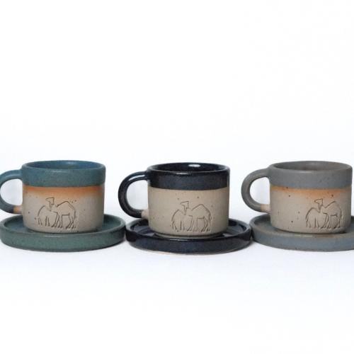 كوب مع صحن عام الابل