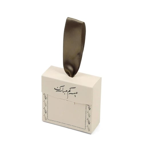 شمعة الأقحوان مع تغليف العيد