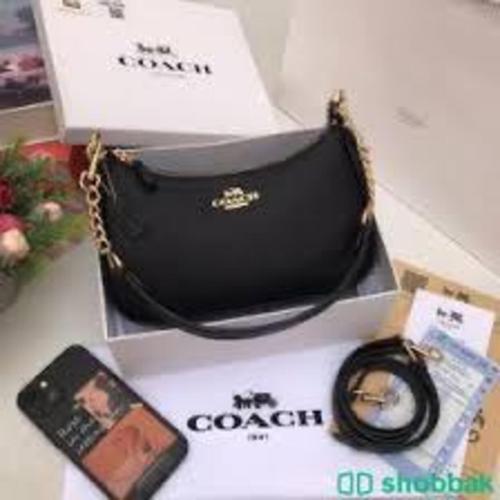 شنطه ماركه ماستر اسود