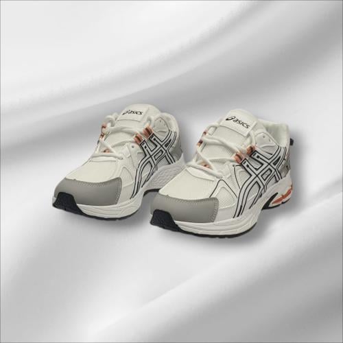 Casual white shoes with touches of blue and orange