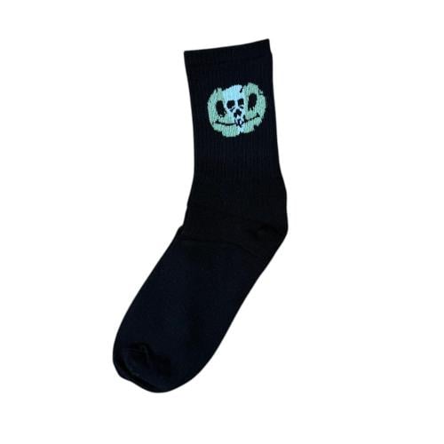 Black drink with green skull print