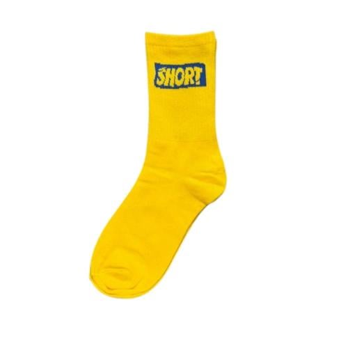Yellow drink with "SHORT" print