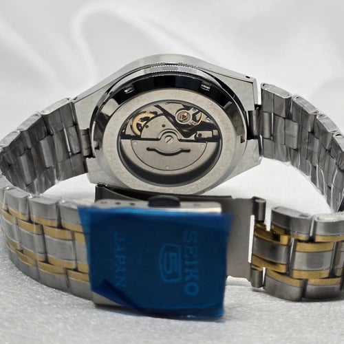 ساعة SEIKO اوتوماتيك رجالي اطار رمادي و مخطط ذهبي